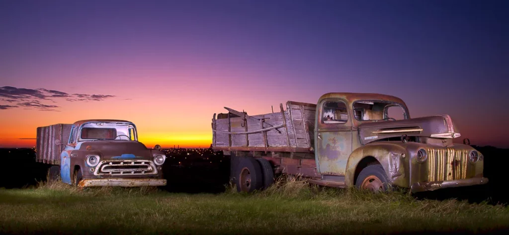 Old truck in farmers field left 2 rust