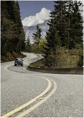 example of s curve photography where you are seeing a winding road around a mountain